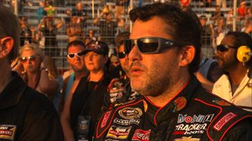 NASCAR driver Tony Stewart, driver of the #14 Bass Pro Shops car, waits