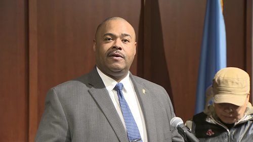 Woman 'very likely' killed herself and her two young children at Boston garage, official says