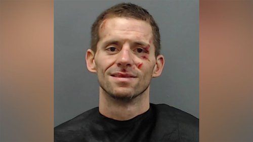 Police have caught the inmate who escaped jail by carving through a brick wall