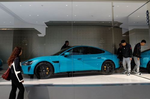 China's Xiaomi joins the crowded EV race with 'dream car' to take on Tesla - Vimarsana News