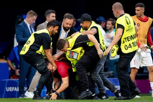 Portugal manager expresses 'concern' after several fans invade p - KAKE